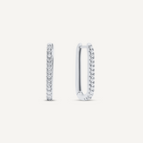 925 Sterling Silver oval shaped hoops that click close with a latch and are studded with small, round clear Cubic Zirconia crystals.